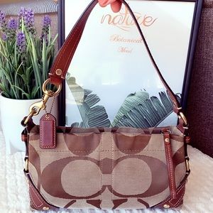 Coach shoulder bag with pocket